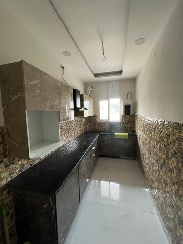 Kitchen in 2 BHK Builder Floor at Adarsh Panache Heights, Kulhan – for Rent