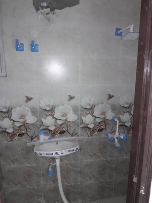 Bathroom in 3.5 BHK Builder Floor at Baraula – for Sale