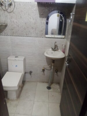 Bathroom in 2 BHK Builder Floor at Sun Homes, Shakti Khand Iii – for Sale