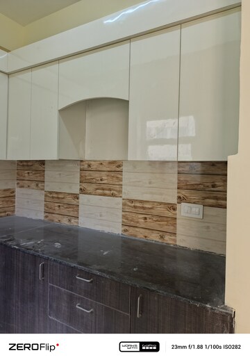 Kitchen in 2 BHK Apartment at Amrapali Enchante, Tech Zone 4 Greater Noida – for Rent