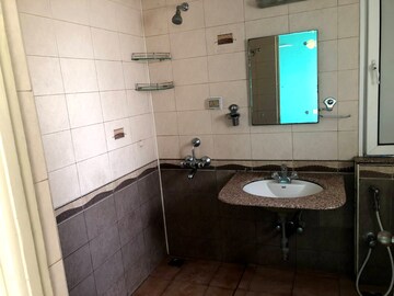 Bathroom in 3 BHK Apartment at Godrej Woodsman Estate, Hebbal – for Rent