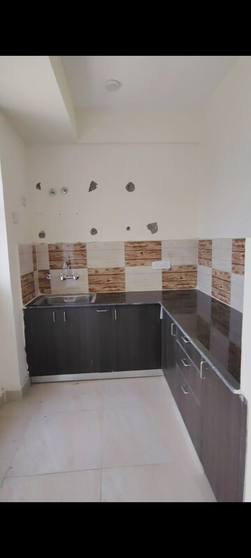 Kitchen in 2 BHK Apartment at Amrapali Enchante, Tech Zone 4 Greater Noida – for Rent