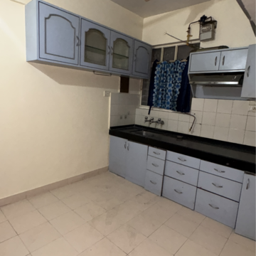 Kitchen in 2.5 BHK Apartment at Kolte Patil Rose Paradise, Nibm – for Rent