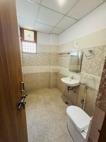 Bathroom in 3 BHK Builder Floor at Mahanagar – for Rent