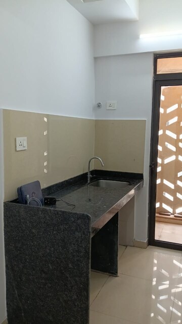 Kitchen in 2 BHK Apartment at Lodha Palava Downtown, Dombivli East – for Rent