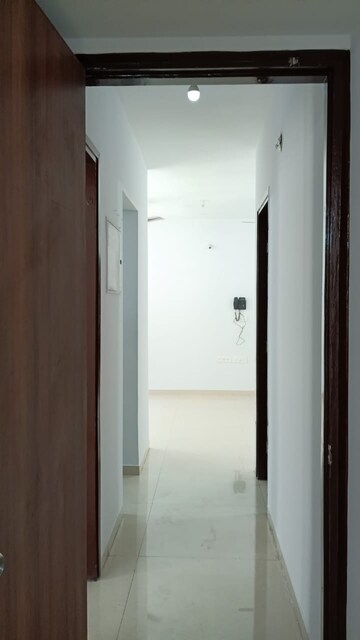 Living Room in 2 BHK Apartment at Lodha Palava Downtown, Dombivli East – for Rent