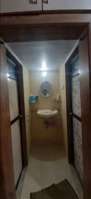 Bathroom in 2 BHK Apartment at Marigold Building, Virar West – for Sale