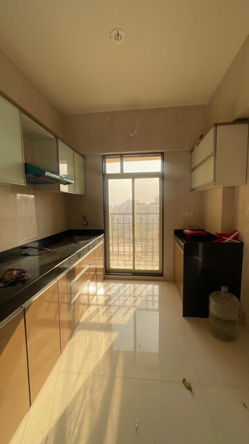 Kitchen in 1 BHK Apartment at Agarwal Paramount, Virar West – for Sale