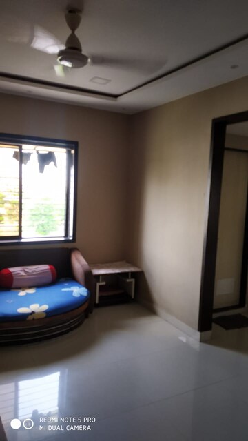 Living Room in 1.5 BHK Apartment at Vip Road Vesu – for Sale