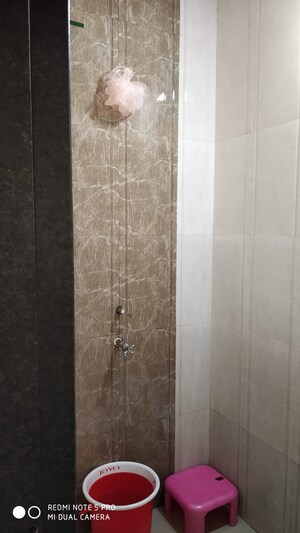 Bathroom in 1.5 BHK Apartment at Vip Road Vesu – for Sale