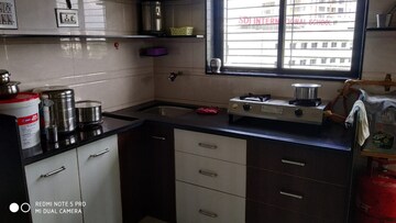 Kitchen in 1.5 BHK Apartment at Vip Road Vesu – for Sale