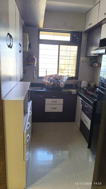 Kitchen in 1 BHK Apartment at Chandak Sparkling Wing, Dahisar East – for Sale