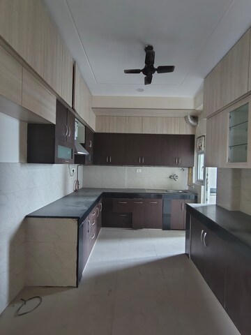 Kitchen in 3 BHK Apartment at Ramprastha Platinum Height, Ramprastha Greens – for Rent