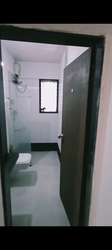 Bathroom in 2 BHK Apartment at Movie Tower, Andheri West – for Rent