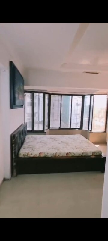 Bedroom in 2 BHK Apartment at Movie Tower, Andheri West – for Rent