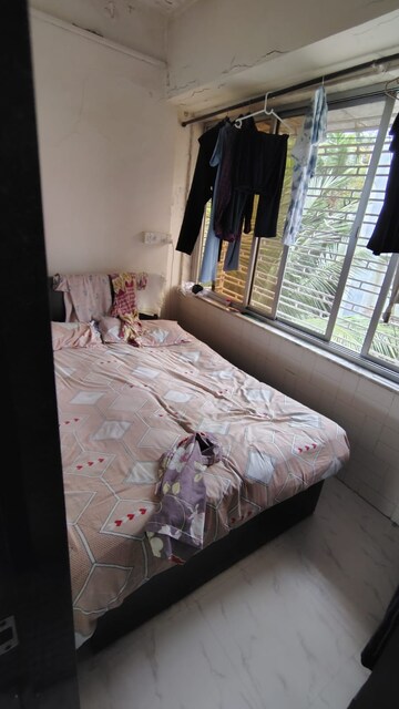 Bedroom in 2 BHK Apartment at Gayatri Darshan, Kandivali East – for Rent