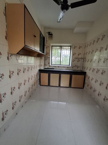 Master Bedroom in 1 BHK Apartment at Gokul Garden CHS, Kandivali East – for Rent