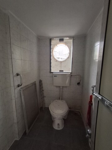 Bathroom in 1 BHK Apartment at Gokul Garden CHS, Kandivali East – for Rent