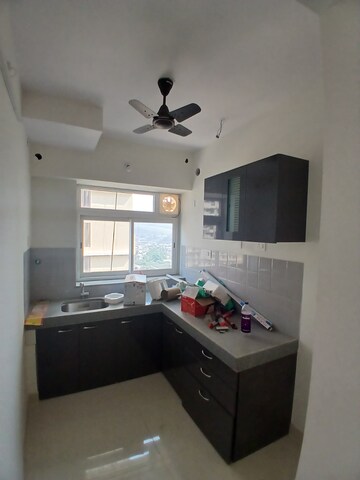 Kitchen in 1.5 BHK Apartment at Shapoorji Pallonji Siennaa, Kandivali East – for Rent