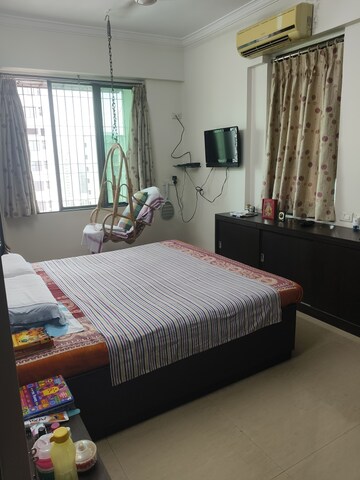 Bedroom in 3 BHK Apartment at Nirmal City Of Joy CHS Ltd, Mulund West – for Sale