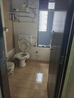 Bathroom in 3 BHK Apartment at Nirmal City Of Joy CHS Ltd, Mulund West – for Sale