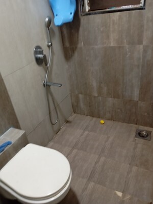 Bathroom in 2 BHK Apartment at N Woods Trishna View, Andheri East – for Sale