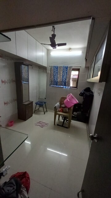 Master Bedroom in 1 BHK Apartment at Nagari Niwara CHS, Goregaon East – for Rent