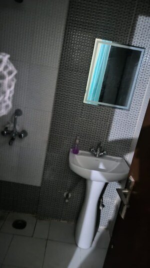 Bathroom in 2 BHK Apartment at Nilaya Greens, Raj Nagar Extension – for Sale