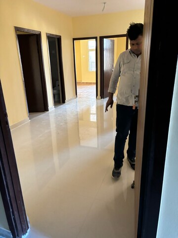 Building Lobby in 2.5 BHK Apartment at Nilaya Greens, Raj Nagar Extension – for Sale