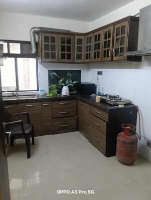 Kitchen in 2 BHK Apartment at Gera Foliage, Viman Nagar – for Sale