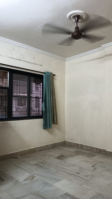 Room in 2 BHK Apartment at Olive Chs Borivali, Borivali West – for Rent