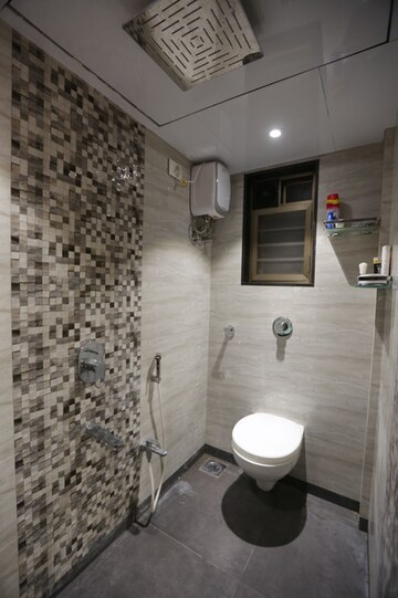 Bathroom in 2 BHK Apartment at Cosmos Heritage, Manpada – for Rent