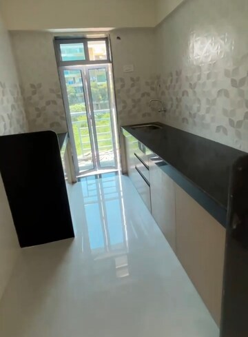 Kitchen in 2 BHK Apartment at Elite Tower Morya Nagar, Nalasopara Vasai Link Road – for Sale