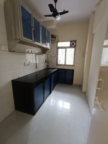 Kitchen in 1 BHK Apartment at New Golden Green CHS, Borivali West – for Rent