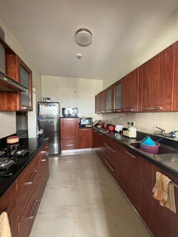 Kitchen in 3 BHK Apartment at Salarpuria Serenity, Hsr Layout – for Rent
