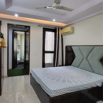 Bedroom in 3 BHK Builder Floor at Panchsheel Enclave – for Rent