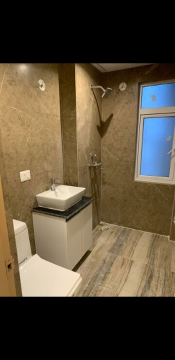 Bathroom in 3 BHK Apartment at Oxirich Avenue, Ahinsa Khand 2 – for Rent