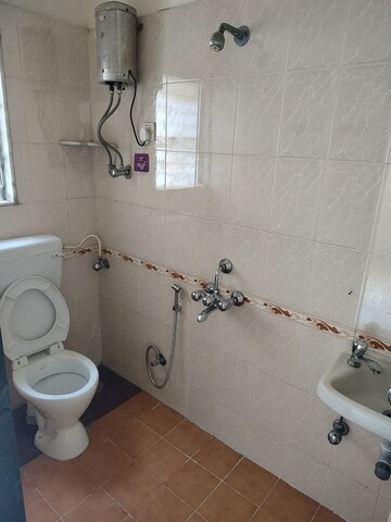 Bathroom in 2 BHK Apartment at Vedant Complex CHS, Samata Nagar – for Rent