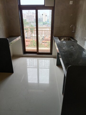 Kitchen in 2 BHK Apartment at KM Horizon Exotica, Haware City – for Rent