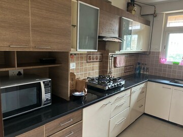Kitchen in 3 BHK Apartment at Hiranandani Tribeca, Ghodbunder Road – for Rent