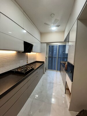 Kitchen in 4 BHK Apartment at Sheth Vasant Lawns, Oswal Park – for Rent