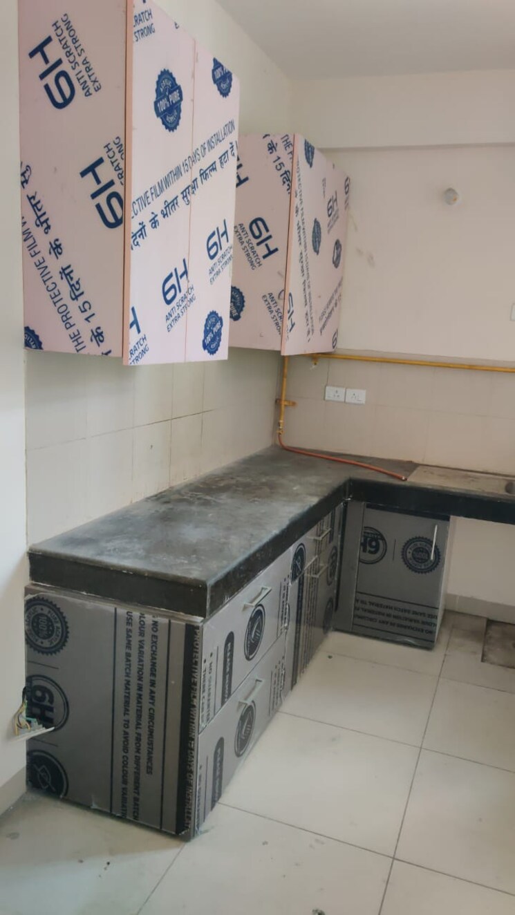 Kitchen, wave-executive-floors 2 Bedroom 900 Sq.Ft. Apartment In Wave City Ghaziabad 8738940