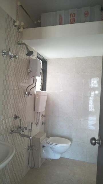 Attached Bathroom in 1 BHK Apartment at Bhoomi Acropolis, Virar West – for Rent