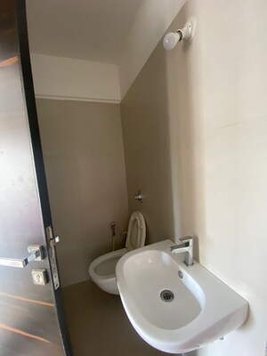 Bathroom in 2 BHK Apartment at Ani Anu Sri Balaji Enclave, Malad West – for Sale