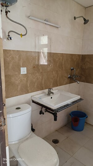 Bathroom in 2 BHK Apartment at Apex Athena, Sector 75 – for Sale