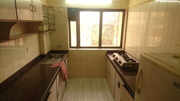 Kitchen in 2 BHK Apartment at Ani Anu Sri Balaji Enclave, Malad West – for Sale