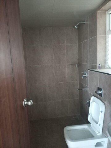 Bathroom in 3 BHK Apartment at Ramky One Karnival, Electronic City Phase I – for Rent