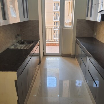 Kitchen in 3 BHK Apartment at Ansal Highland Park, Sector 103 – for Rent