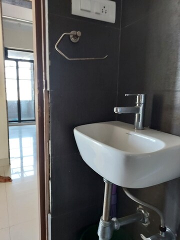 Bathroom in 1 BHK Apartment at Chandak Nishchay, Borivali East – for Rent