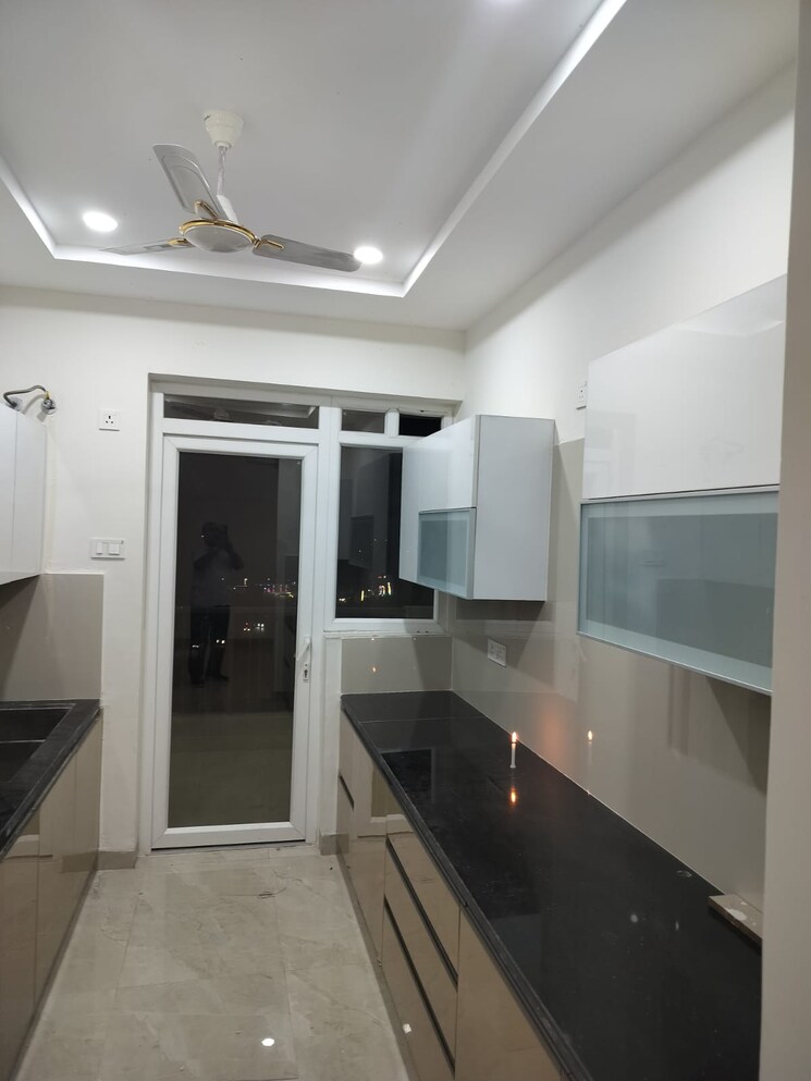 Kitchen, artique-uptown-skylla 2 Bedroom 1200 Sq.Ft. Apartment In International Airport Road Zirakpur 8739312
